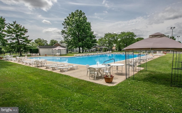 view of pool featuring a gazebo, a yard, and a patio area