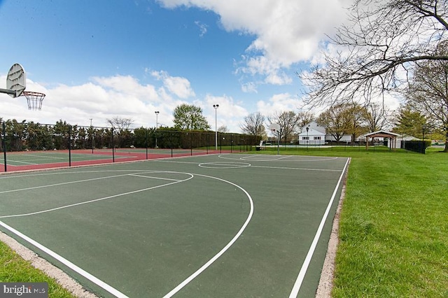 view of sport court with a gazebo and a lawn