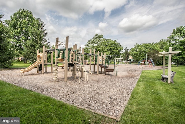 view of jungle gym with a lawn