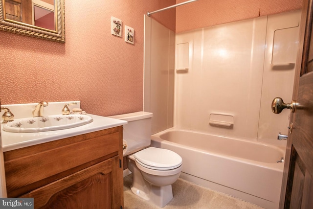 full bathroom featuring vanity, tub / shower combination, and toilet