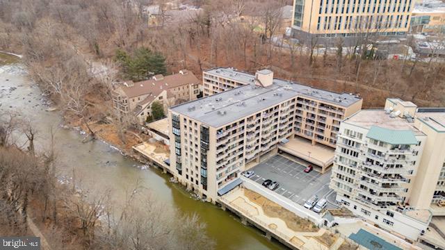 drone / aerial view with a water view and a city view