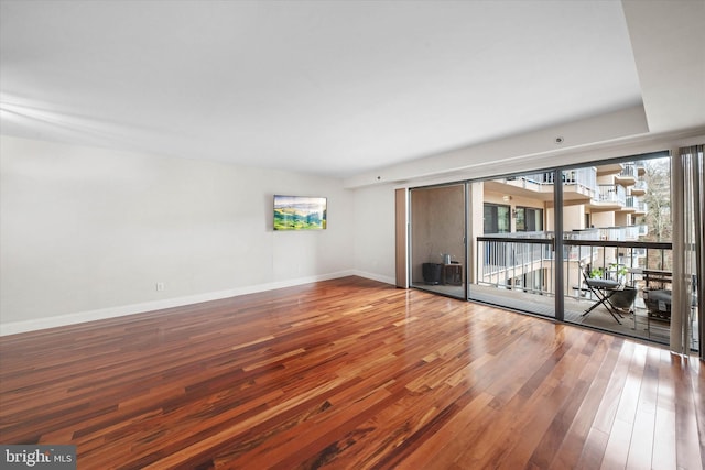 empty room featuring hardwood / wood-style flooring