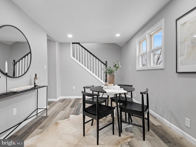 dining space featuring light hardwood / wood-style flooring