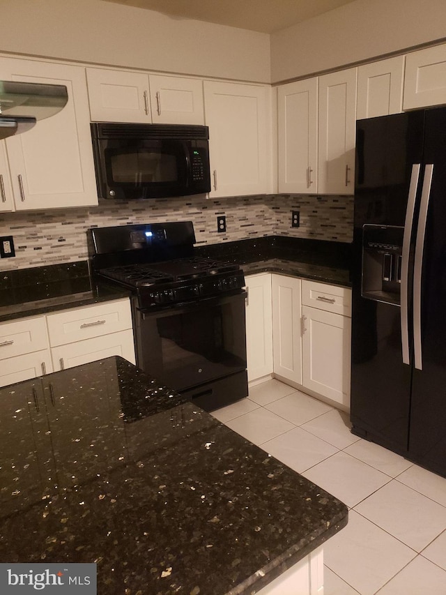 kitchen with white cabinetry, light tile patterned floors, and black appliances