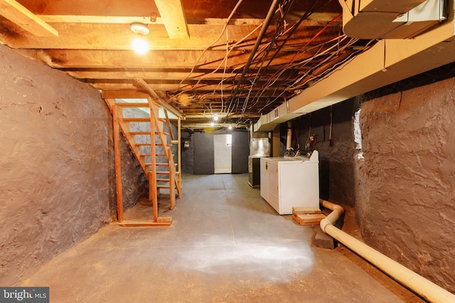 basement featuring washer and clothes dryer