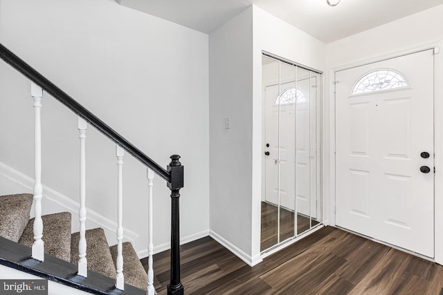 entryway featuring dark wood-type flooring