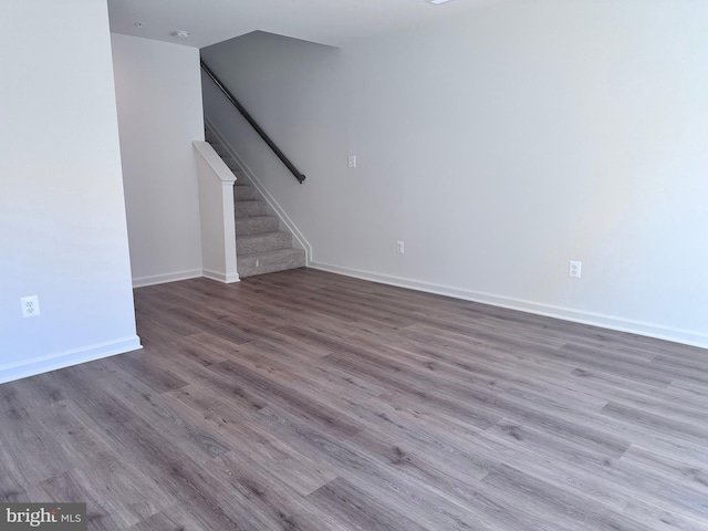 unfurnished living room featuring hardwood / wood-style floors