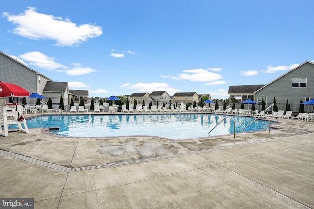 view of pool featuring a patio area