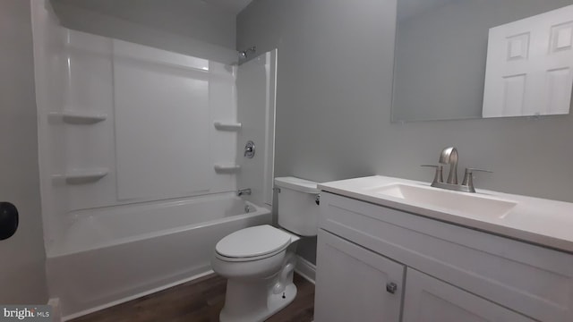 full bathroom with vanity, toilet, bathing tub / shower combination, and hardwood / wood-style floors