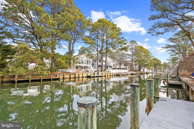 dock area with a water view