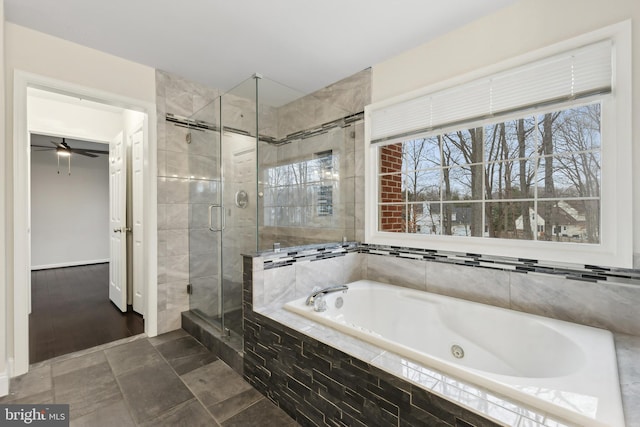 bathroom featuring independent shower and bath