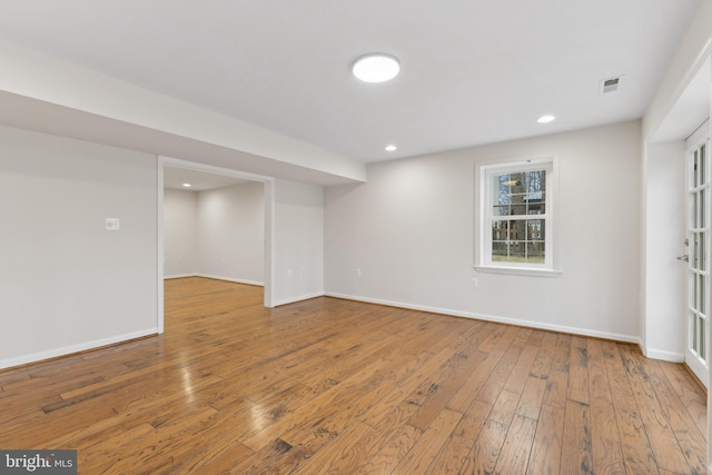 basement with wood-type flooring