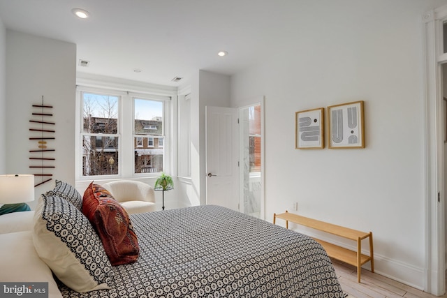 bedroom featuring light hardwood / wood-style floors