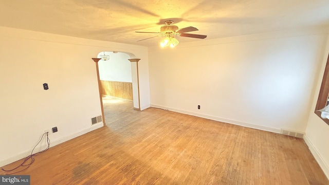 spare room featuring ceiling fan and light wood-type flooring