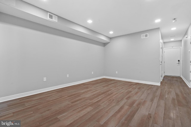 spare room with light hardwood / wood-style floors