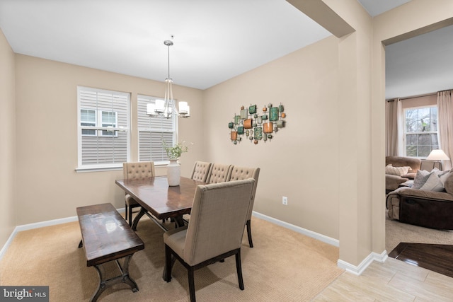 dining room featuring a chandelier