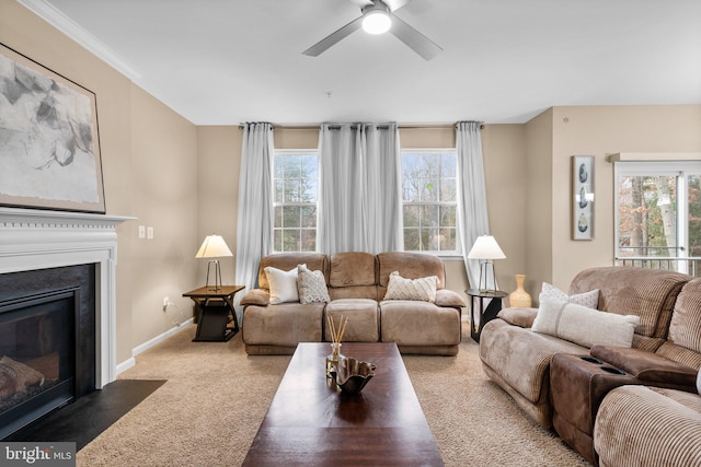 living room featuring carpet flooring and ceiling fan