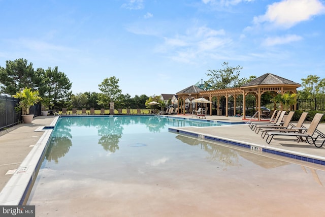 view of pool featuring a gazebo and a patio area