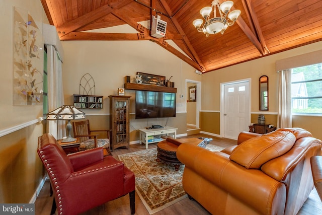 living room with wood ceiling, wood finished floors, a chandelier, and baseboards