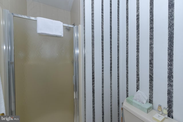 full bath featuring a shower stall