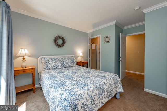 carpeted bedroom featuring crown molding and baseboards