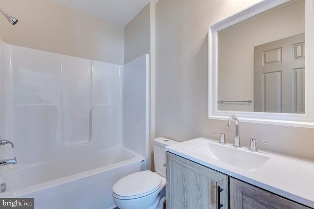 full bathroom with vanity, tub / shower combination, and toilet