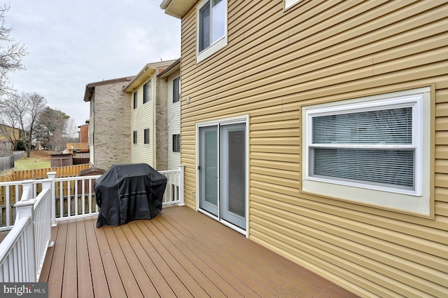 deck featuring a grill