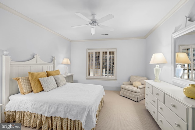 bedroom featuring crown molding, light colored carpet, and ceiling fan