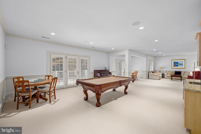 rec room with light carpet, crown molding, billiards, and french doors