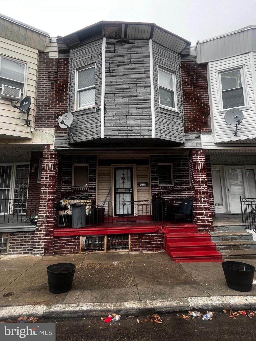 view of property with a porch