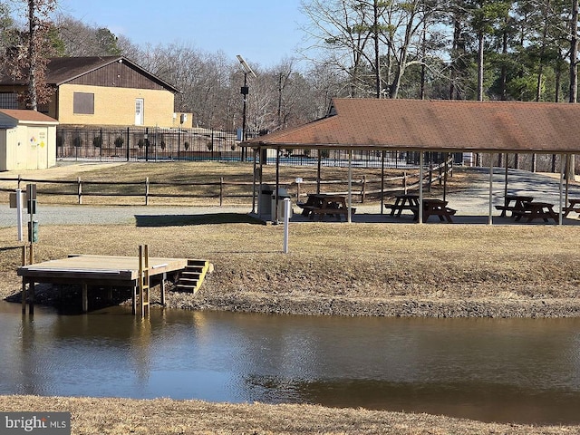 dock area with a water view