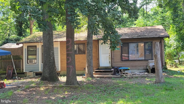 view of front of home with cooling unit