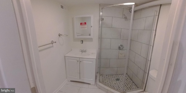 bathroom with vanity and an enclosed shower