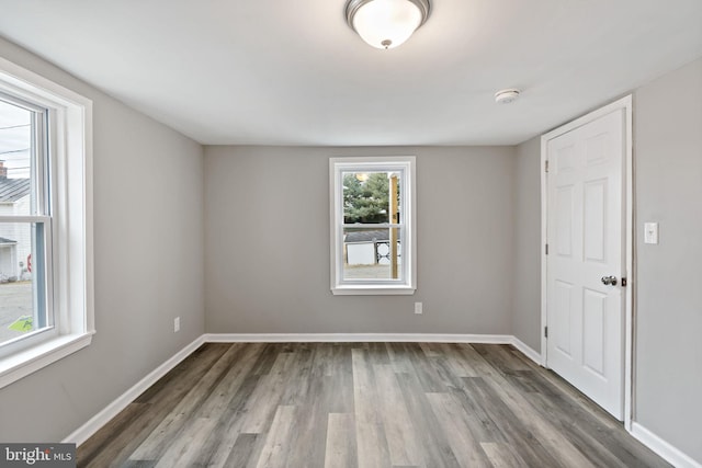 empty room featuring hardwood / wood-style floors