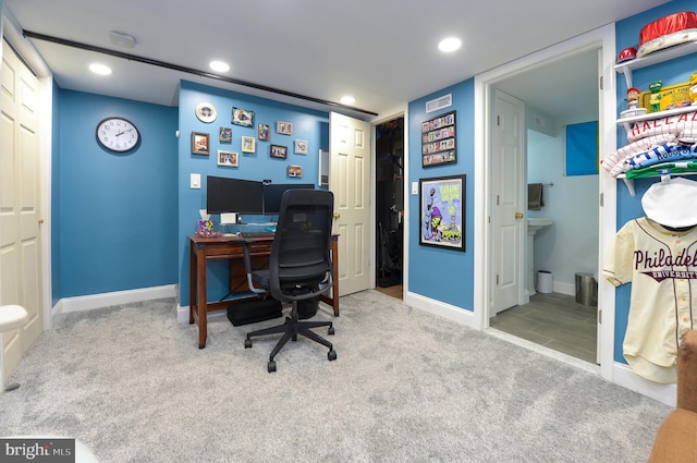 office space featuring light colored carpet