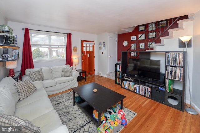 living room with hardwood / wood-style flooring