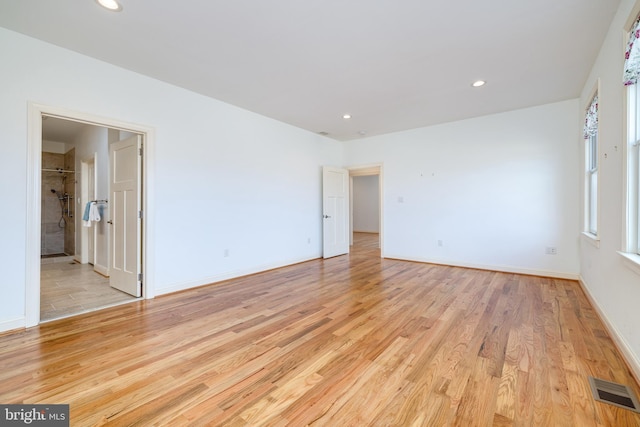 unfurnished bedroom with light hardwood / wood-style flooring