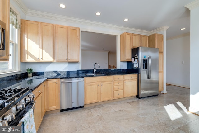 kitchen with light brown cabinetry, sink, crown molding, dark stone countertops, and appliances with stainless steel finishes