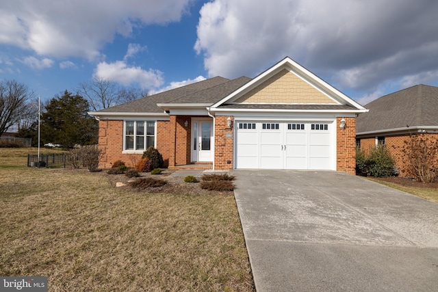 ranch-style house featuring a garage and a front lawn