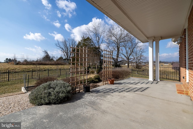 view of patio with a rural view