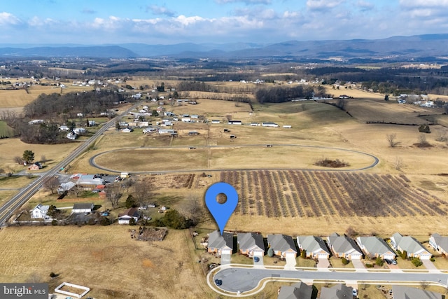 drone / aerial view featuring a mountain view