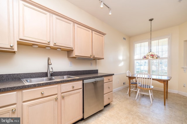 kitchen with sink, hanging light fixtures, dishwasher, and light brown cabinets