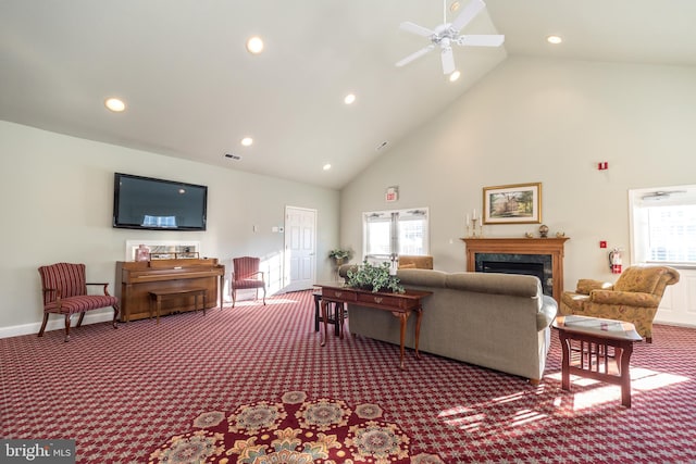 living room with carpet and high vaulted ceiling