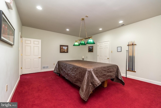 bedroom featuring dark colored carpet