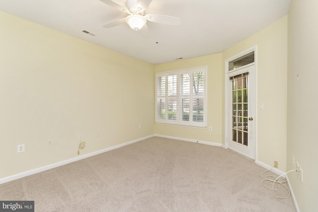 400 Symphony Cir Unit 136E, Cockeysville, MD 21030 - empty room featuring carpet flooring, a ceiling fan, and baseboards