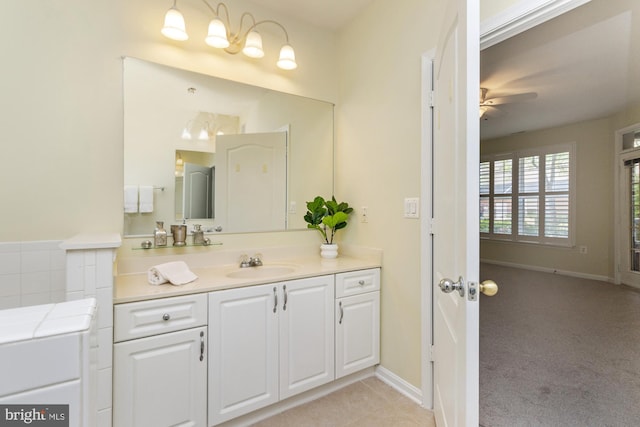 400 Symphony Cir Unit 136E, Cockeysville, MD 21030 - bathroom featuring a ceiling fan, vanity, and baseboards