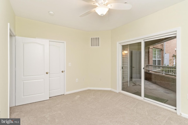 400 Symphony Cir Unit 136E, Cockeysville, MD 21030 - unfurnished bedroom with carpet flooring, baseboards, a closet, and a ceiling fan