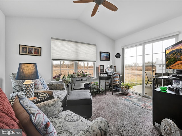 carpeted living room featuring vaulted ceiling and ceiling fan