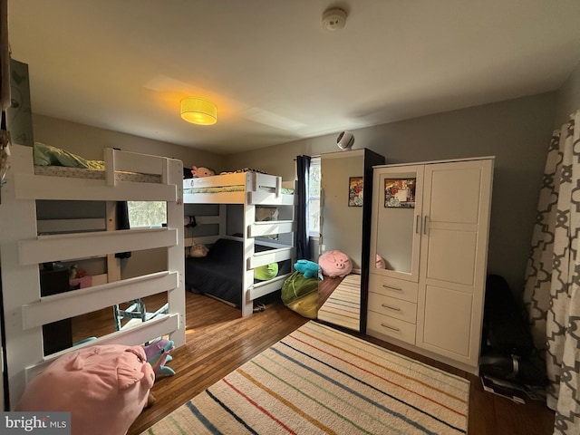 bedroom with hardwood / wood-style flooring