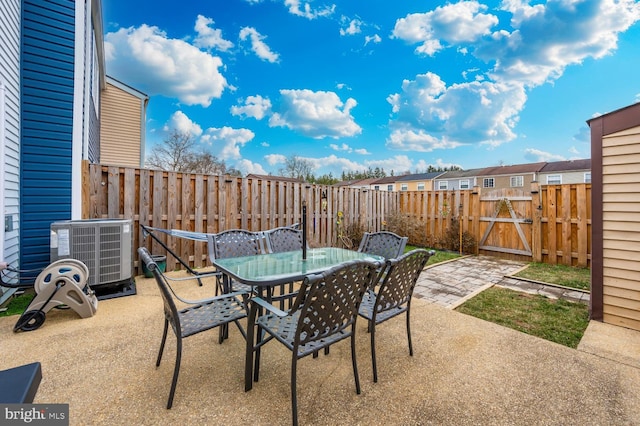 view of patio with central AC unit